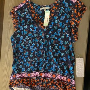 Short sleeves/sleeveless floral blouse
